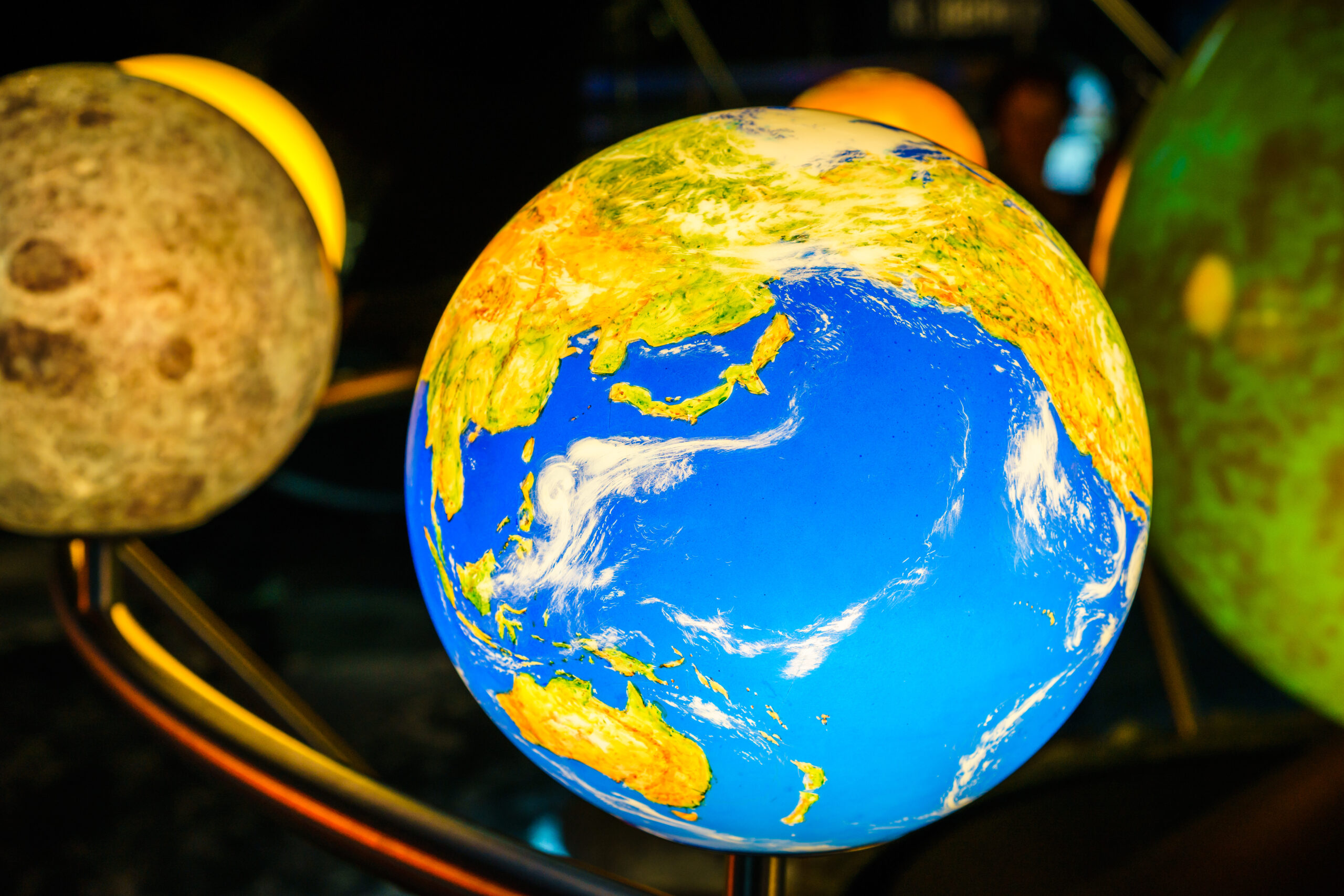 Close-up shot of planets in a model solar system.